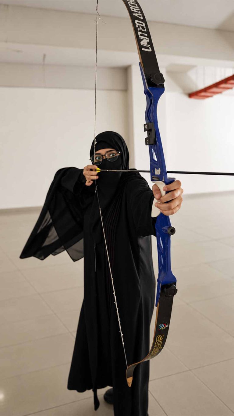 Niqab-Clad Archer in Training Hall